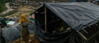 Soaked and hungry Rohingya refugees seek shelter in Bangladesh