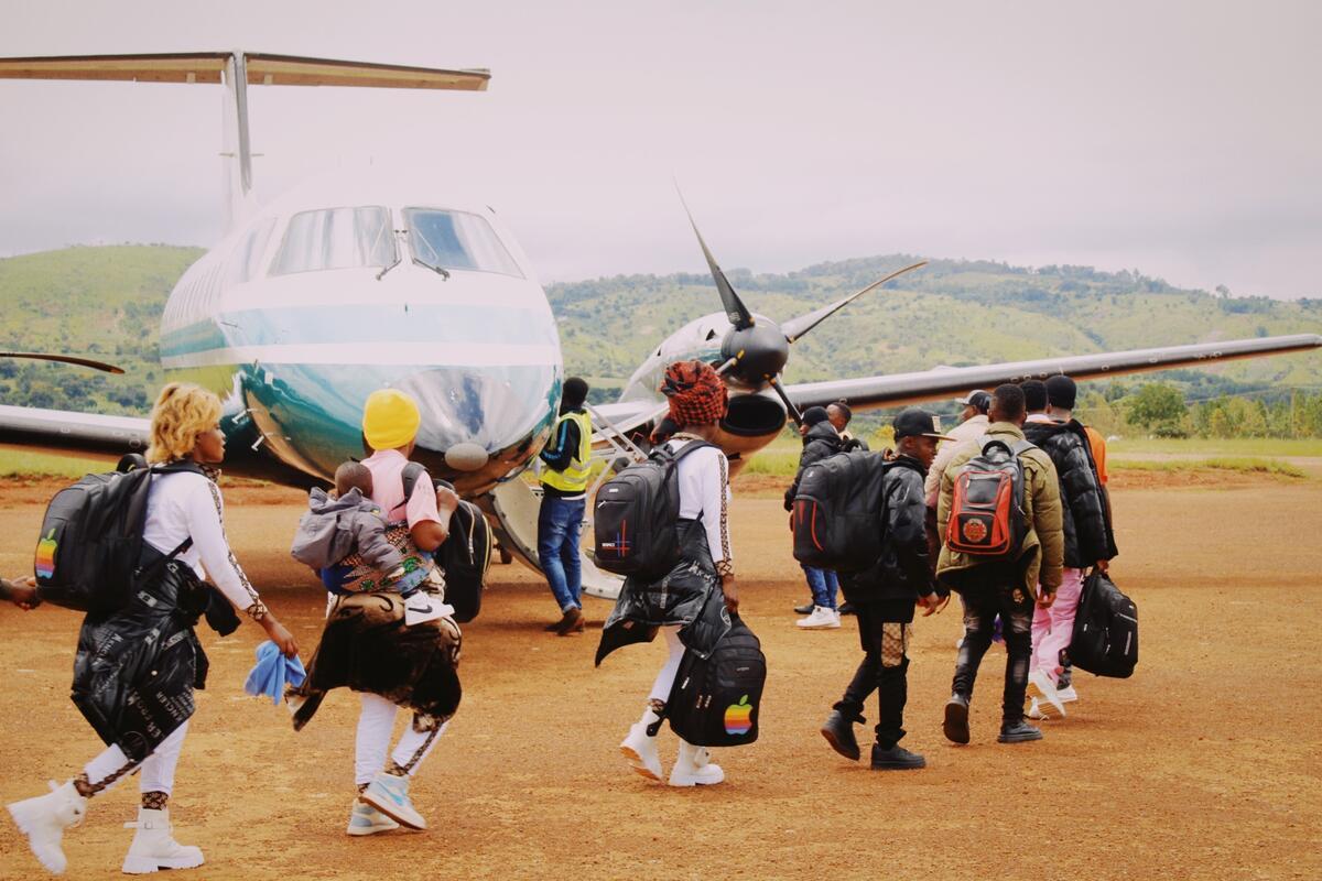 Tanzania. Resettlement families depart from Kasulu airstrip to Dar es Salaam to catch their international flights to third countries