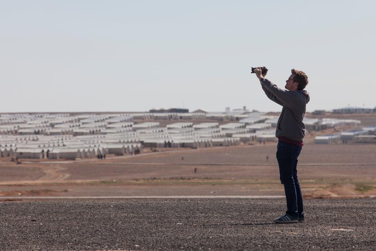 Jordan. UNHCR High Profile Supporter John Green in Azraq refugee camp