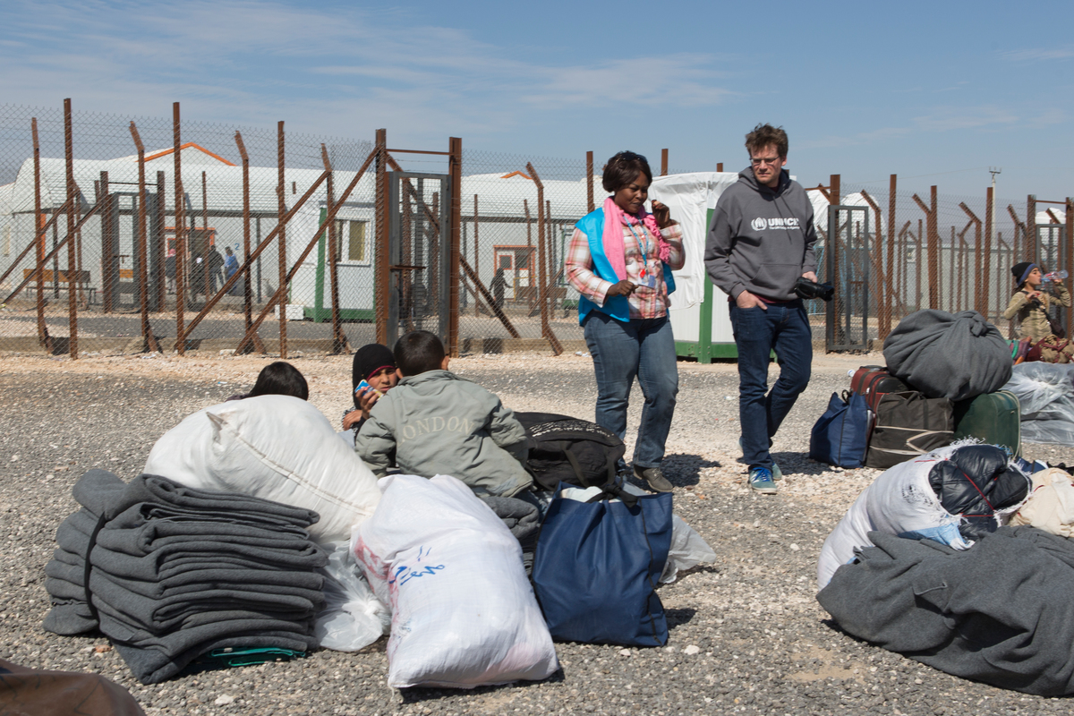 UNHCR High Profile Supporter John Green in Azraq refugee camp learning about the arrival and reception process