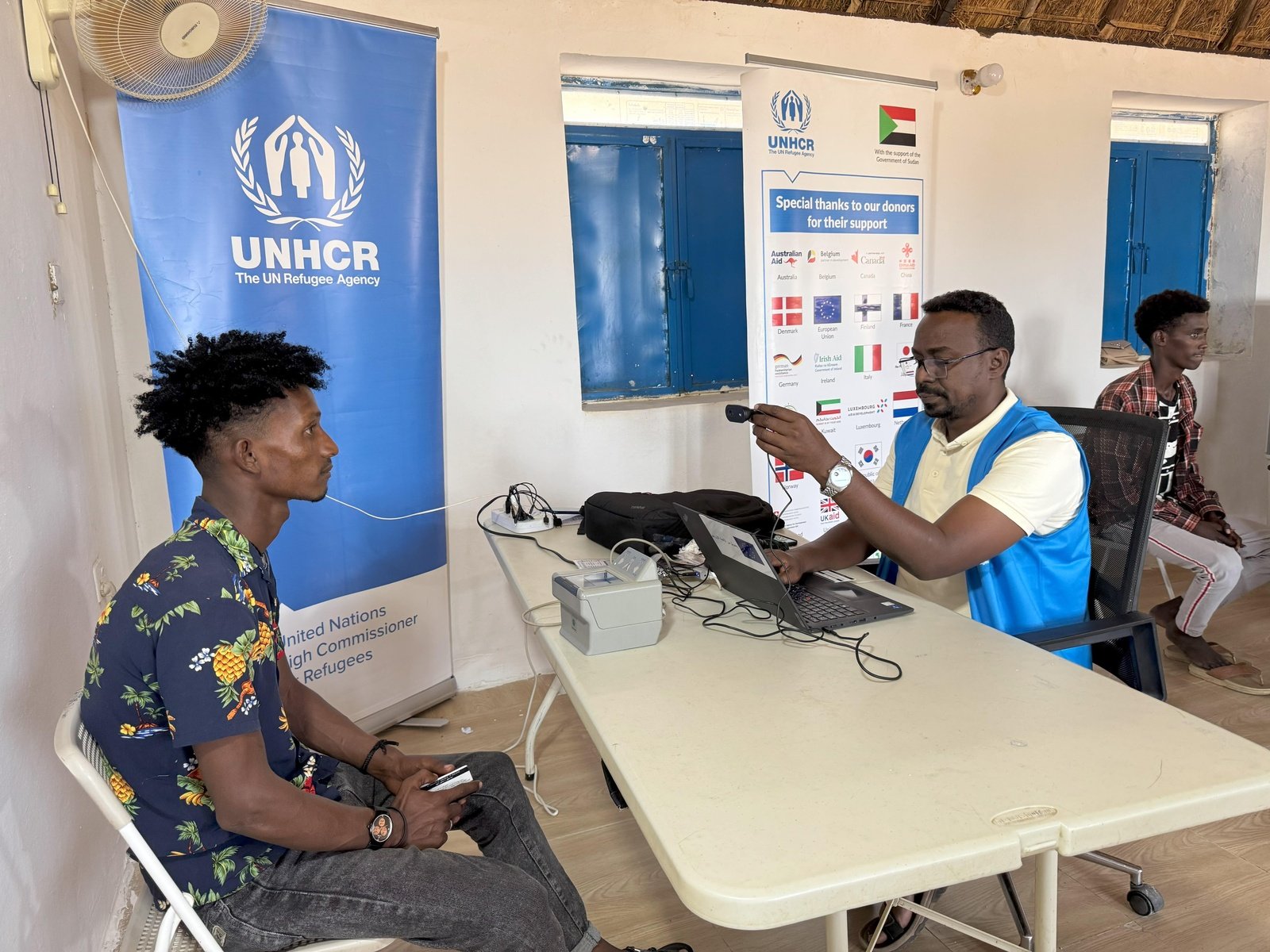 Refugees and asylum-seekers undergo registration at the UNHCR registration desk in Um Gargour camp in Sudan's Gedaref State.