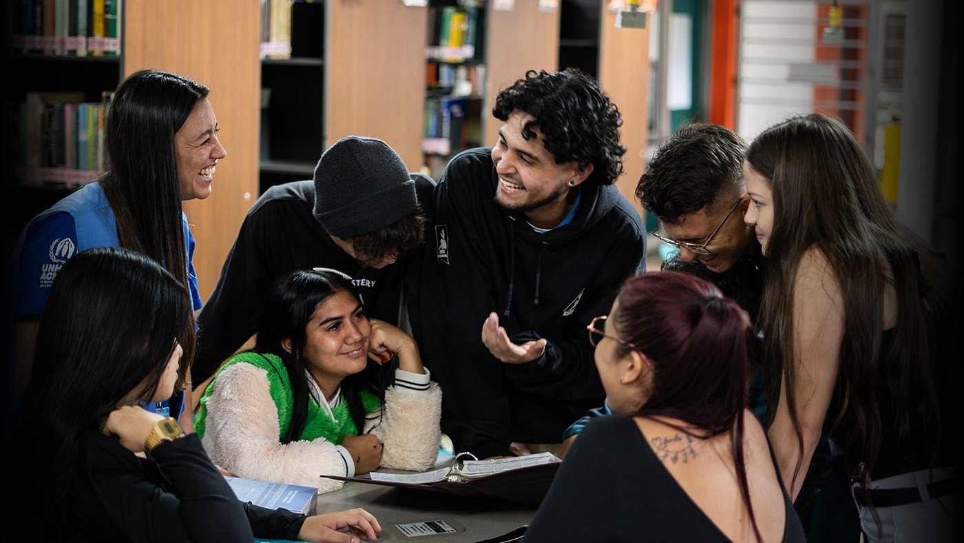 Colombia. First generation of DAFI Scholars in Medellín, Colombia, study at the library and share experiences with UNHCR official. 