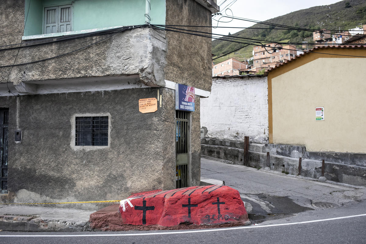 Colombia. Red stone in memory of a Venezuelan woman