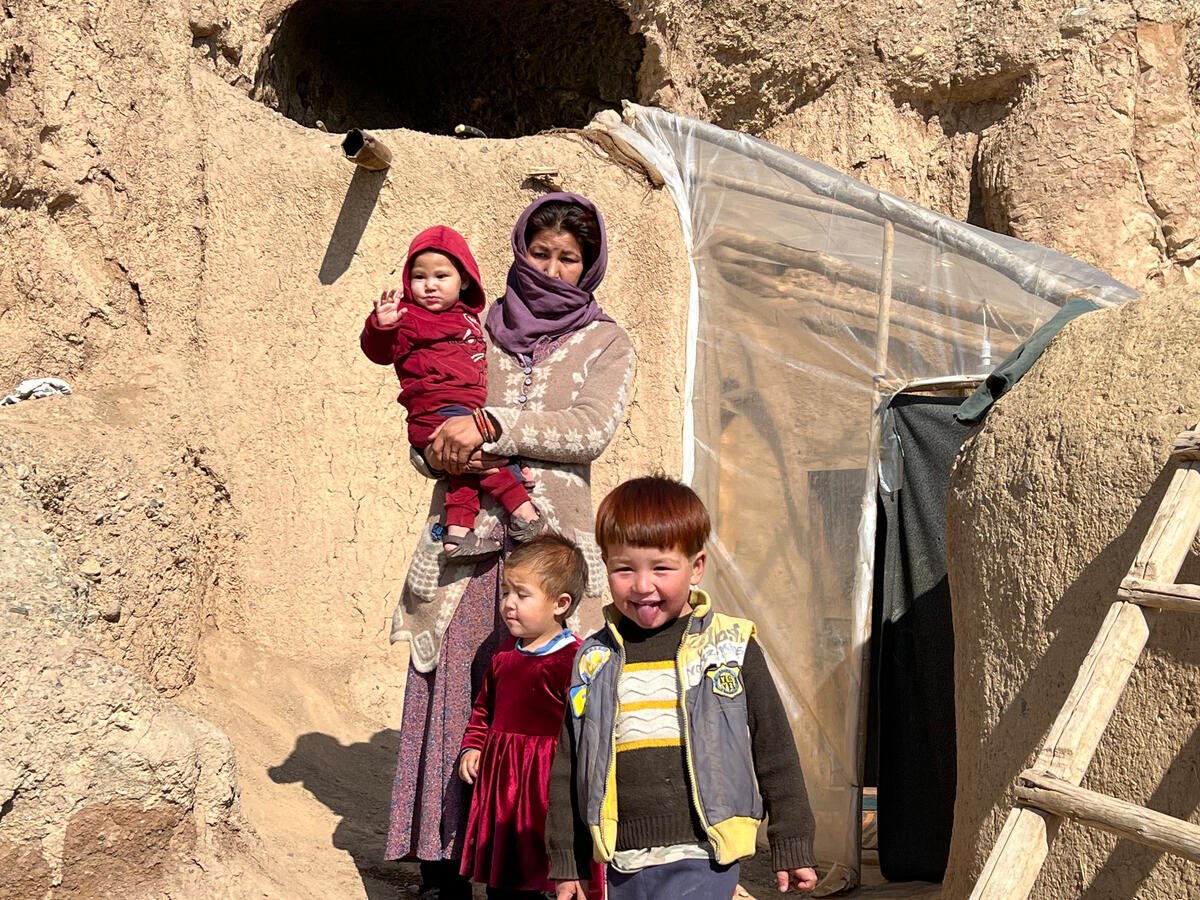 Afghanistan. Vulnerable family living in cave cliffs receive financial support from UNHCR