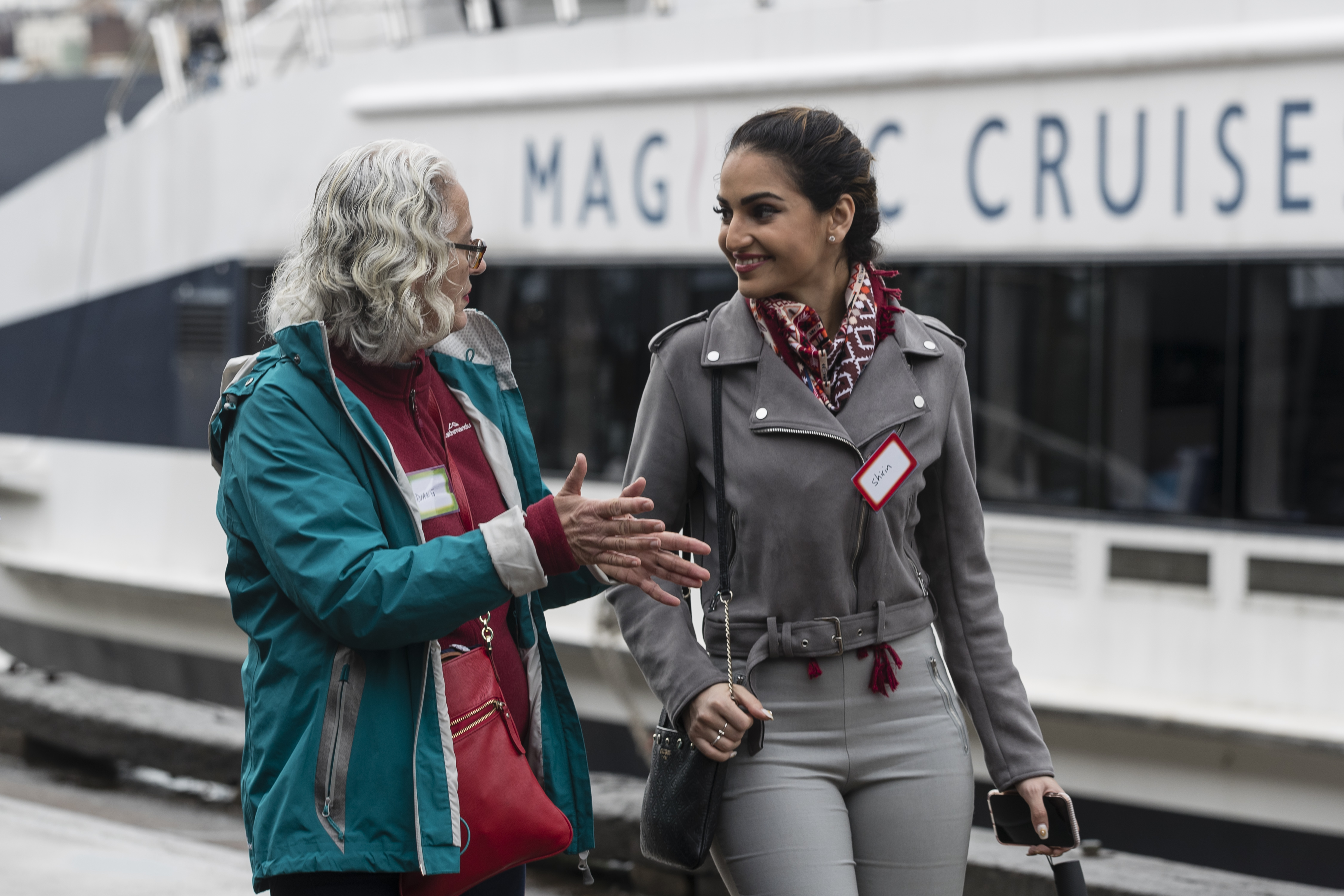 Australians walk together with their neighbours from refugee backgrounds around Sydney harbour to celebrate World Refugee Day.