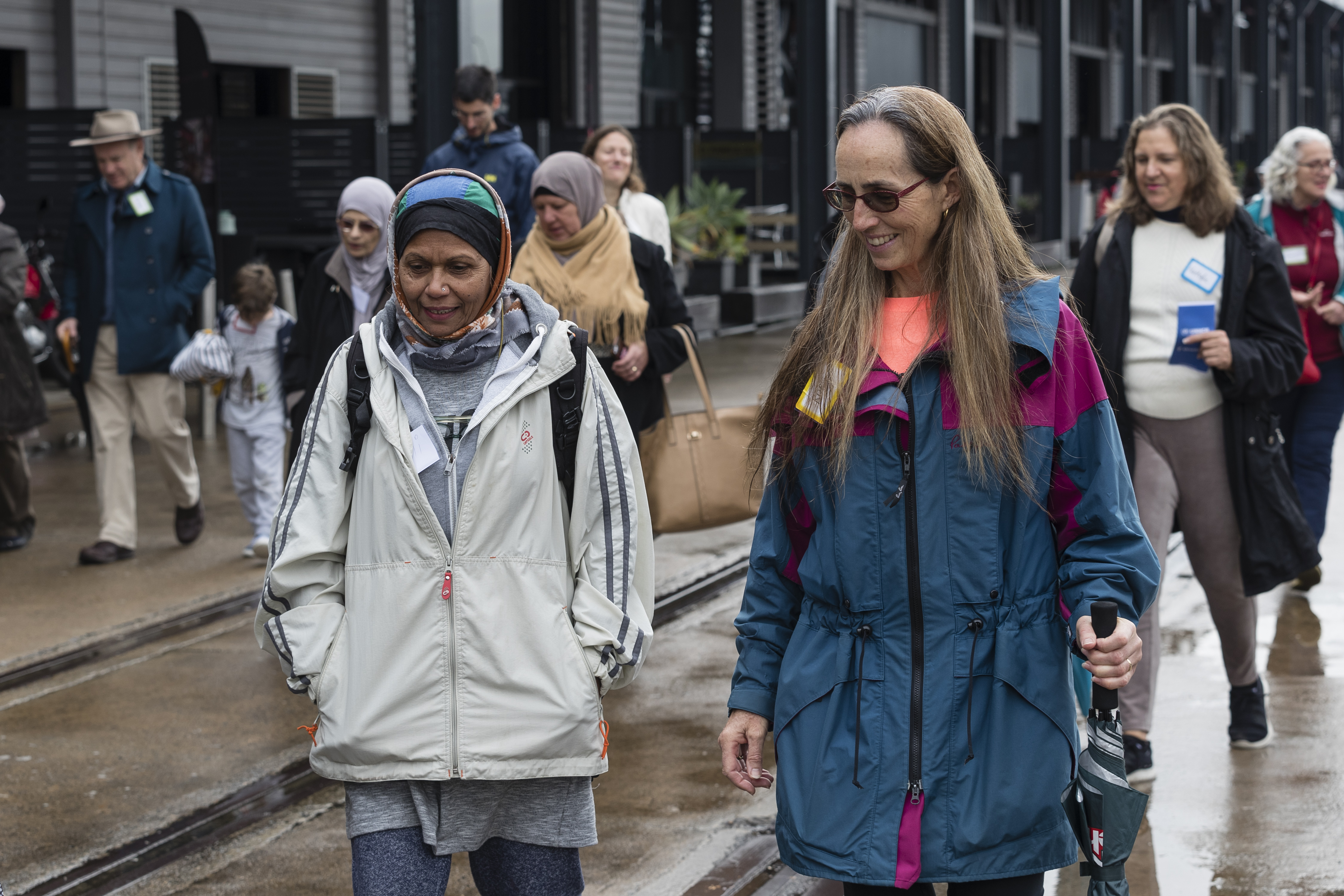 Australians walk together with their neighbours from refugee backgrounds around Sydney harbour to celebrate World Refugee Day.