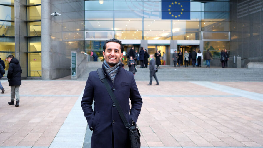 Ahmad Wali Ahmad Yar, a former refugee from Afghanistan, PhD researcher at the Vrije Universiteit Brussel and President of the Umbrella Refugee Committee in front of the European Parliament in Brussels. ©UNHCR/Nina Daelemans
