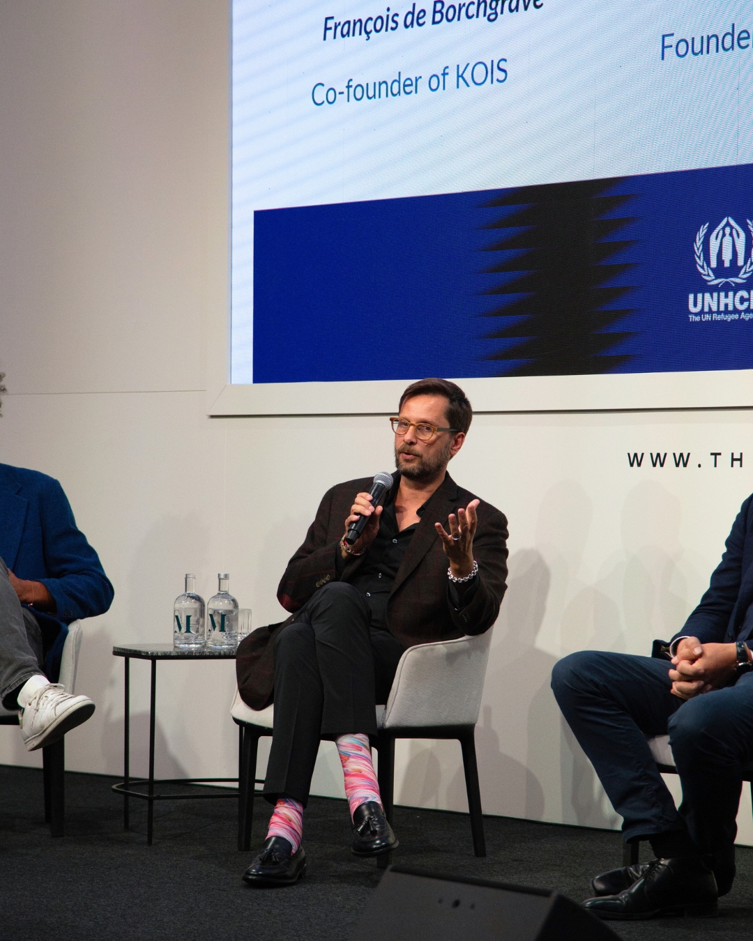 Jean-Nicolas Beuze, vertegenwoordiger van UNHCR België op het podium.