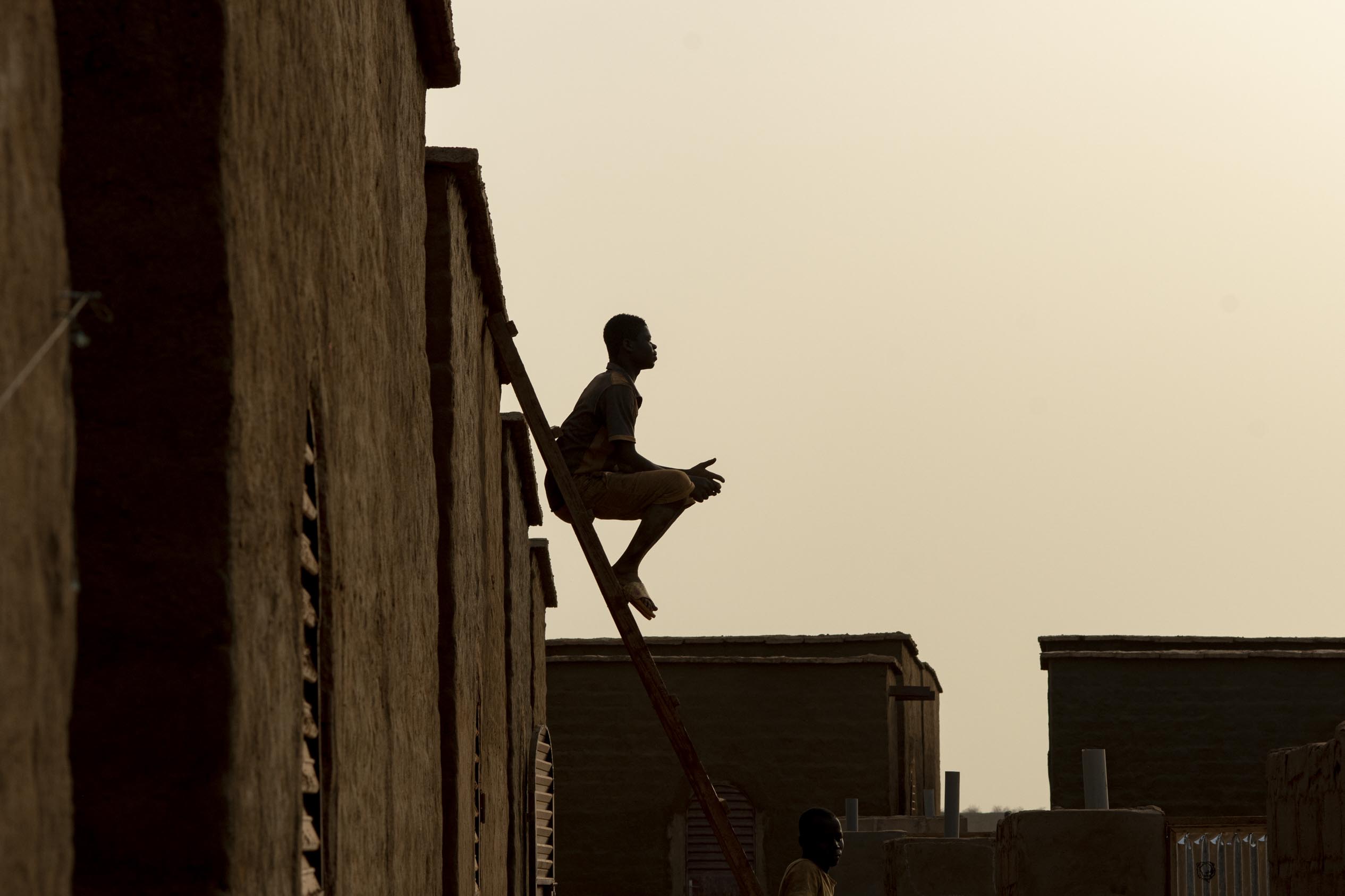 Burkina Faso. Internally Displaced and locals learn to build eco-friendly homes for themselves.