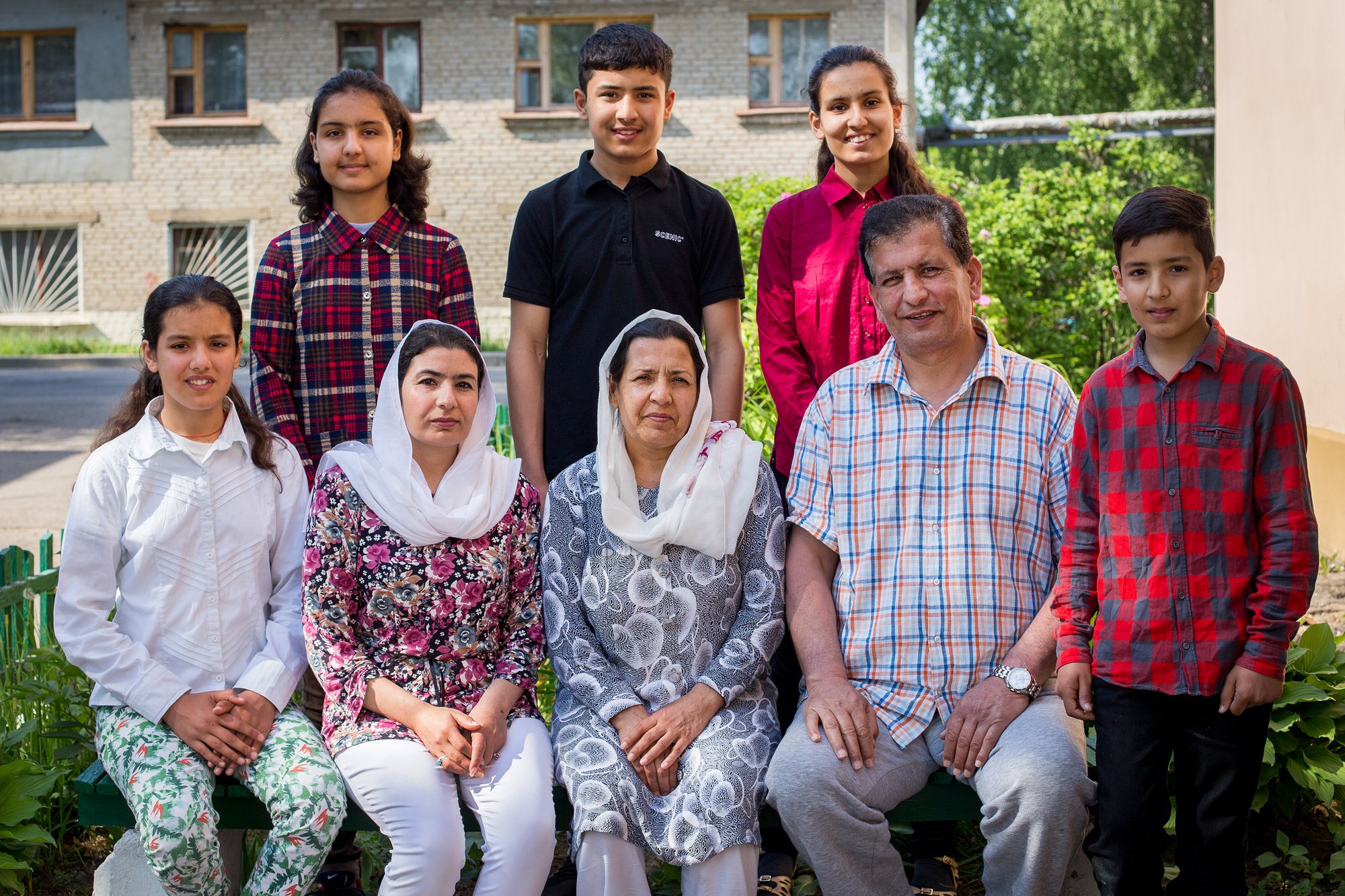 Fahima and Nasrin arrived in Belarus in the Autumn of 2019. At the time of the interview it was July scorching. The sisters make tea with green cardamom beans in the kitchen of the temporary accommodation center for the applicants for refugee status or complementary protection in Viciebsk. This drink reminds them of their homeland and refreshes them on a hot day. The sisters left Afghanistan a few months ago. Their homeland has been troubled for thirty years now, and it is particularly difficult for women who are subject to persistent discrimination. Nasrin, 34, lived in Kabul and worked as a teacher at school. "The district where I worked was an area of Pashtun concentration. Every time I went to school, strangers with threats approached me in the street," she remembers. Her elder sister Fahima with her husband Nematullah and six children lived in Logar province, 40 kilometers from Kabul. Fahima worked for an organization that protected women's rights. "Women are not encouraged to be engaged in social work there," there is sadness and fatigue in Fahima's voice and pain in her eyes. "I have received threats many times. One day I let a woman into the organization without knowing that her husband was connected to the Taliban... Fearing for the life of my family, we were forced to leave our homeland". Fahima was lucky to marry at age 24 by mutual consent, and her husband didn't object that his wife worked. Nematulla worked at a service station and took part in the project of the Belgian organization — taught Afghan orphans to do repairs and helped them to become car mechanics. The Taliban told these children to better join jihad. Nematullah also began to receive threats regularly. All their kids went to school, but it wasn't safe. The eldest son was invited to jihad, and parents were told that their daughters shouldn't be at school and should better stay home. Fahima was worried that the girls could be kidnapped: in Afghanistan, which is considered one of the most dangerous countries for women, they can still be married by force. Where their family lived, only the city center belonged to the authorities, and no one guaranteed security. Their family wanted to go to Europe, but they were detained at the border. They didn't know anything about Belarus before, but having lived here for a while, they decided to stay and take root. "The difference between our countries is huge. In Belarus, women are independent, have the right to education, they can work and support themselves, decide what to do," Fahima says. "If we had this, I would never leave Afghanistan". "People are good here," Nasrin smiles, "and I can work. It's important for me to contribute". Fahima's family and her younger sister settled in a temporary accommodation center. Thanks to the Belarusian Red Cross, they receive food and allowance. They buy medicines themselves, but their cost is partially reimbursed. Nematulla's got a job in the bakery, but he has heart problems and diabetes, so he is at the hospital and isn't working yet. The eldest son, 21-year-old Hamayun, was helped to get to work. There are four food outlets in Viciebsk, and their owner employs people regardless of their nationality. Fahima says that at first her children didn't leave the temporary accommodation center. They were worried: are they going to grow up and never finish school? "Then the UNHCR Representative in Belarus came to visit us, and when he found out that children didn't attend school, he quickly solved this problem — and I am so grateful for that," she said. Children adapted to new conditions faster than adults. Of course, they miss friends in Afghanistan, but have already made new ones in Belarus. They learn the language and are happy that they can now attend school safely.18-year-old Mariam wants to become a doctor, 15-year-old Yalda — a manager, 14-year-old Fayaz — an engineer, 13-year-old Deba — a lawyer, 10-year-old Said — a businessman. Fahima's family has filed a petition for protection in Belarus, she wants their "fate to be decided". They like Belarus, its people who are kind and friendly. "My only dream is for children to get education. Our late grandmother wanted it very much," says Fahima. "My husband has a heart disease, and I will not live forever either, so we really want our kids to be educated and find their place in society".