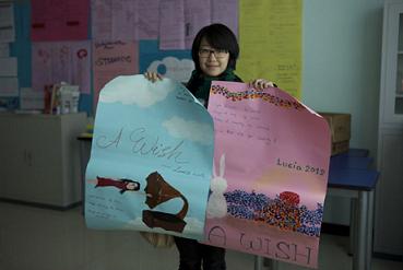 Susan Yue joins Lucia Zhou to draw some fundraising posters