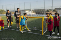 Ahead of World Refugee Day, UNHCR, AEK FC, and Athens Comics Library stand with refugees through sport