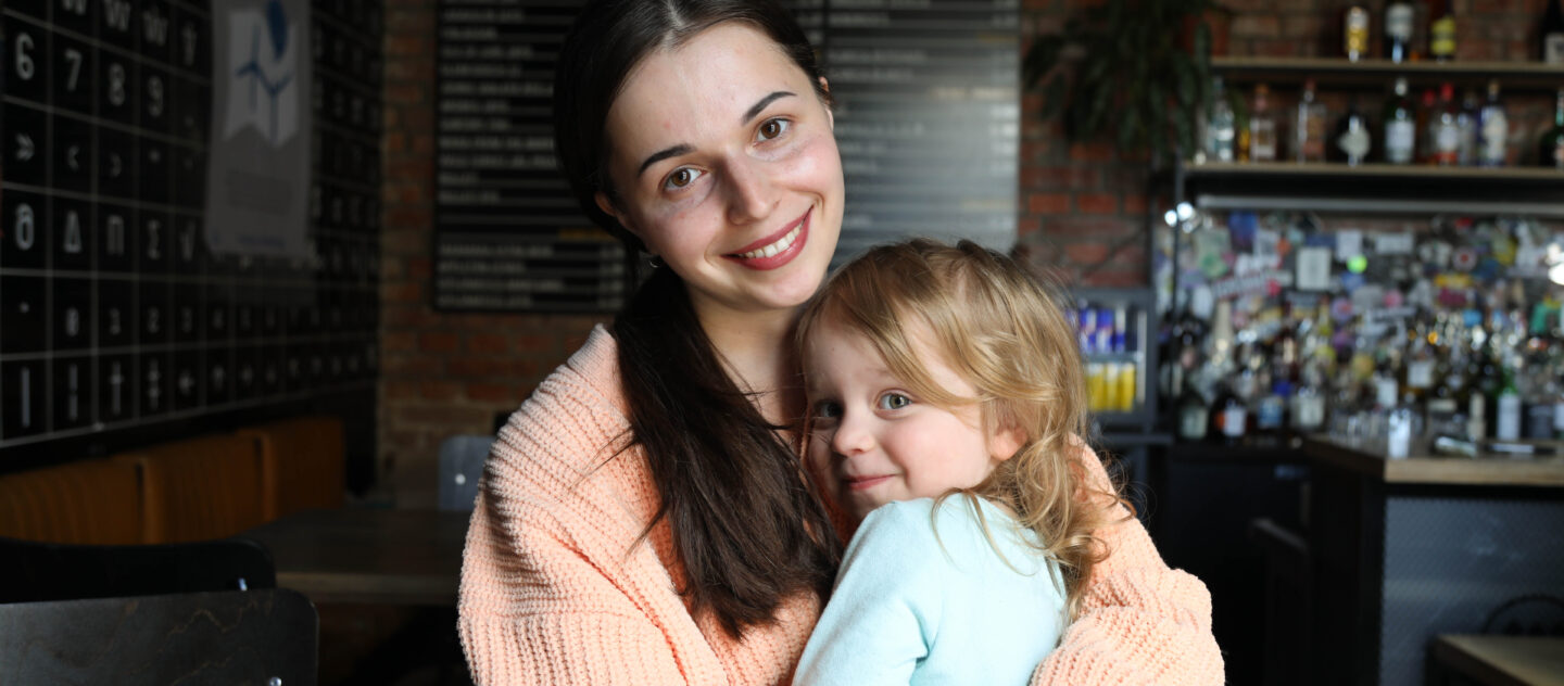 'Victoria, 31, together with her daughter Olivia, 3,5. Victoria is from Kharkiv Ukraine. She arrived to Slovakia in 2018 and is a psychologist working on child-inclusion. When Russia's full-scale invasion of Ukraine broke out in February 2022, and refugees started arriving to Slovakia, Victoria saw the need for a safe space for mothers and children. In April 2022, she opened up her centre 