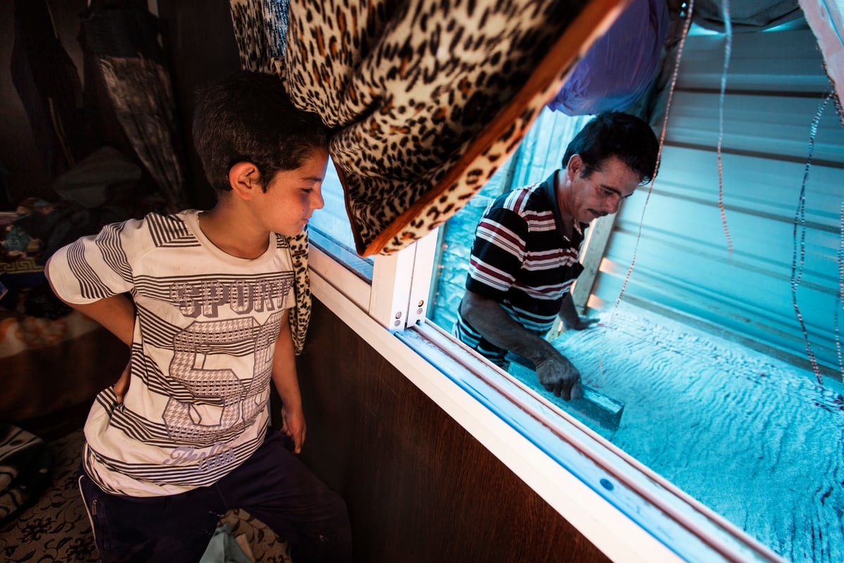 Jordan. Syrian sweet maker serves up a taste of home