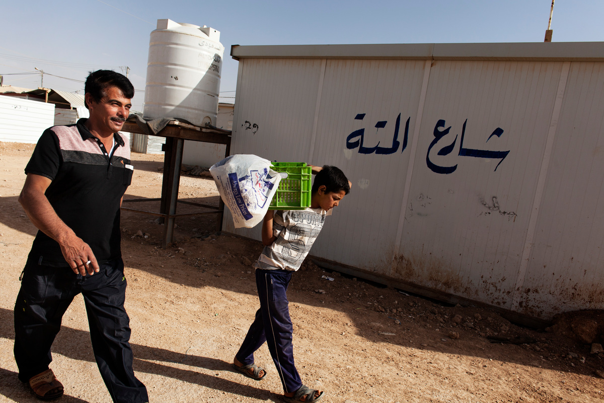 Jordan. Syrian sweet maker serves up a taste of home