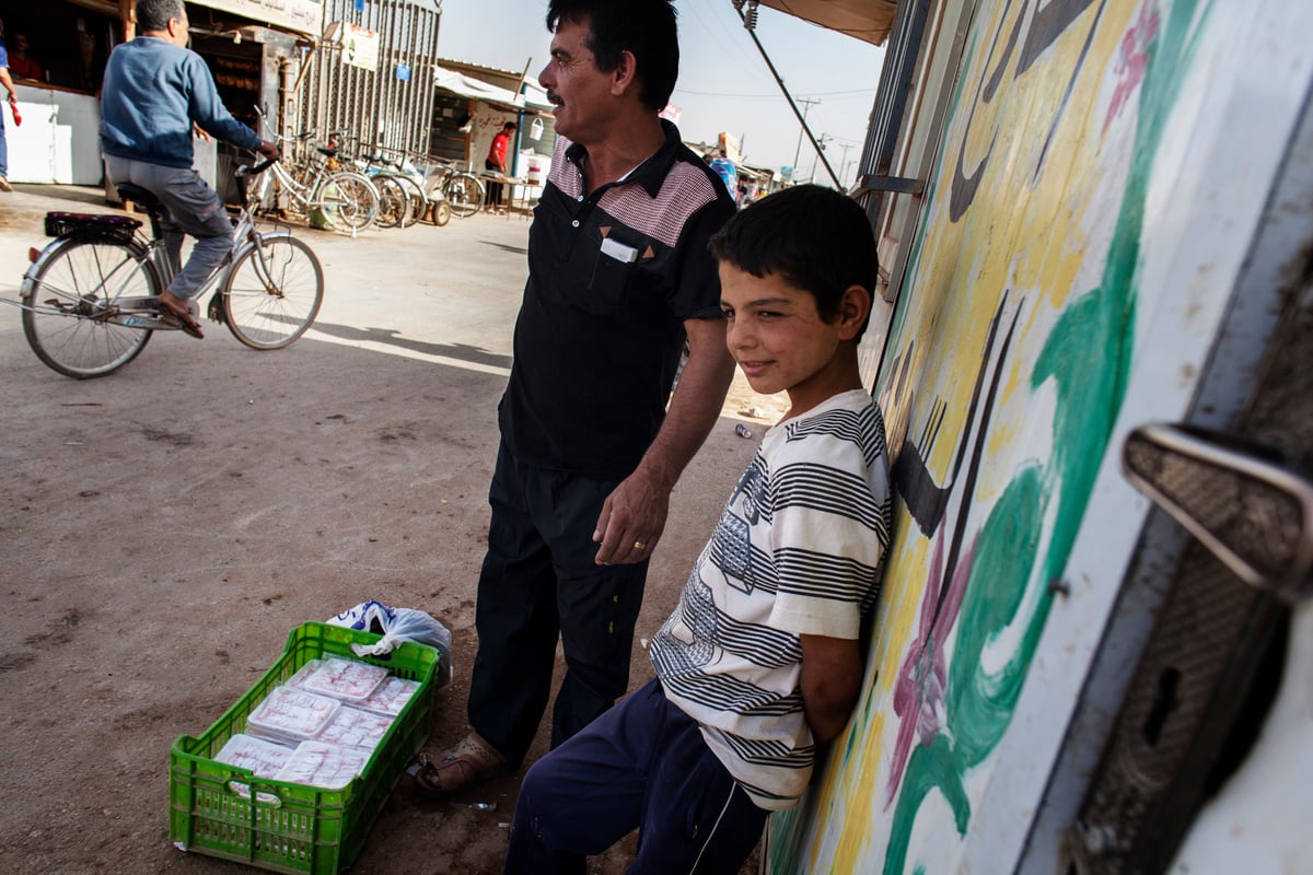 Jordan. Syrian sweet maker serves up a taste of home