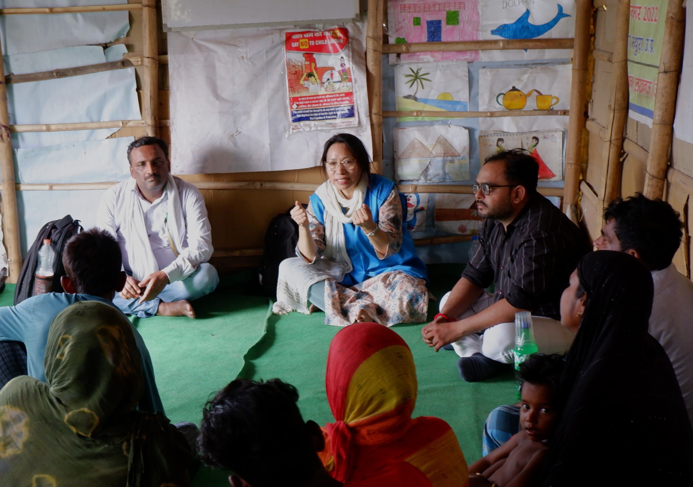 UNHCR India staff in community meetings