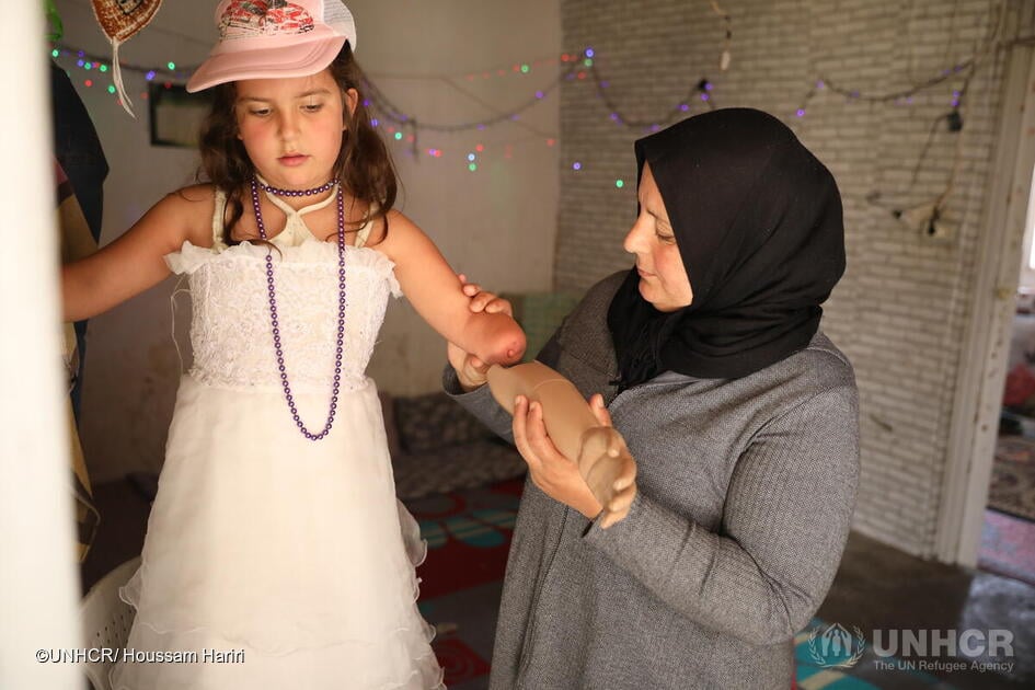 Lebanon. UNHCR supports disabled Syrian refugee girl with prosthetic arm
