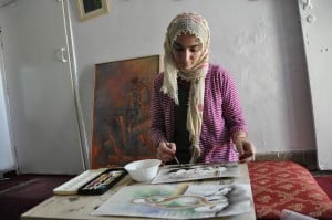 Afghan refugee defies oppression with paint