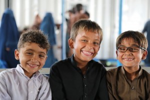 Three brothers – in light mood - posing for a photograph at the Voluntary repatriation Centre. © UNHCR/Q.K.Afridi