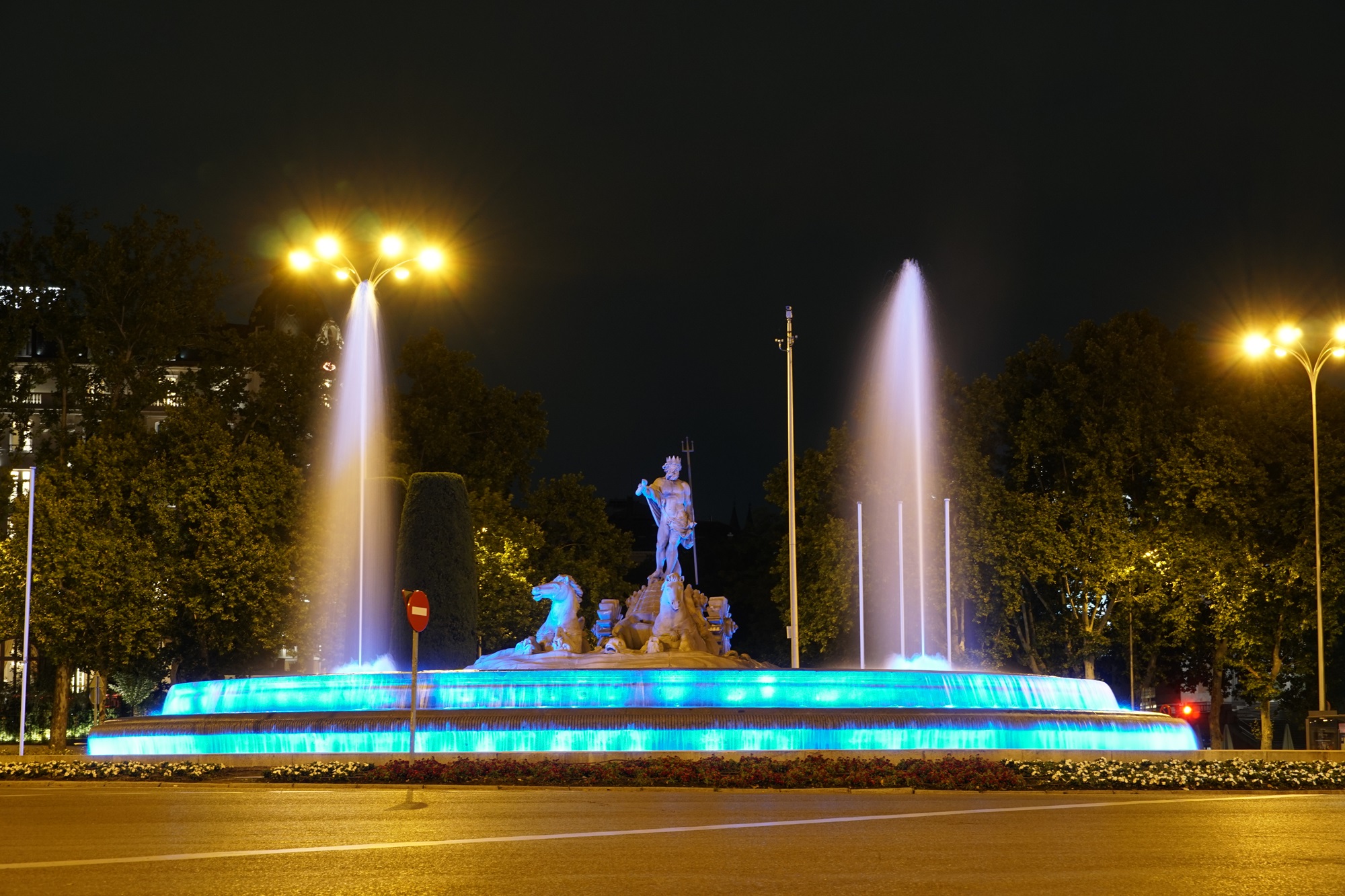 Neptune Fountain in Madrid, Spain in Blue
