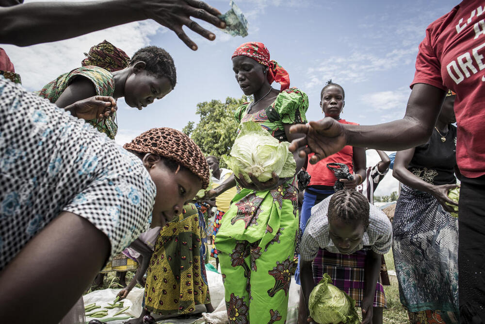 Farming together, refugees and their hosts reap benefits | UNHCR