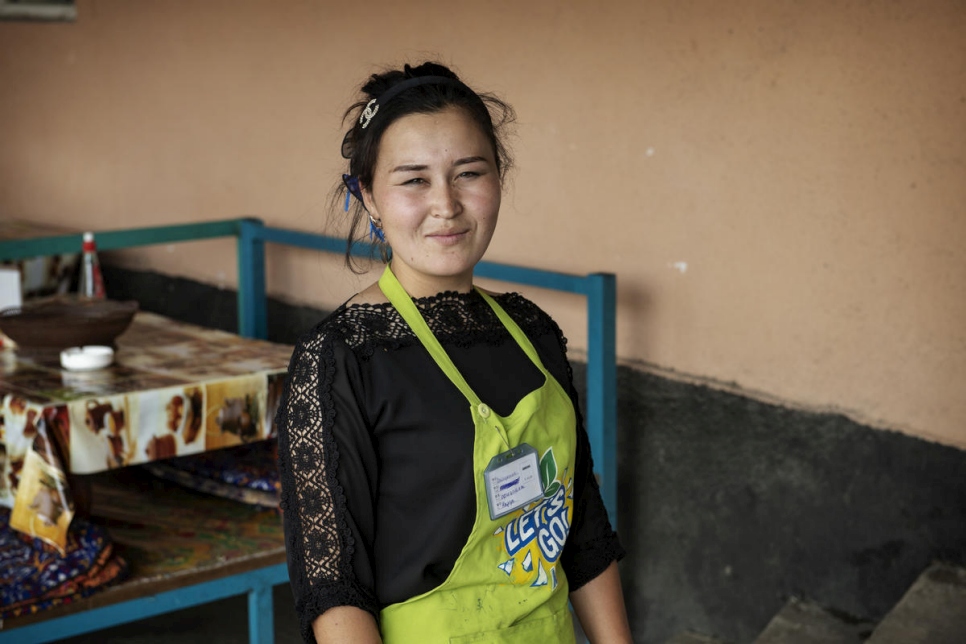Previously stateless, Nazgul Avaz Kyzy, 22, is now a full citizen of Kyrgyzstan and able to work legally at a local café. © UNHCR/Chris de Bode